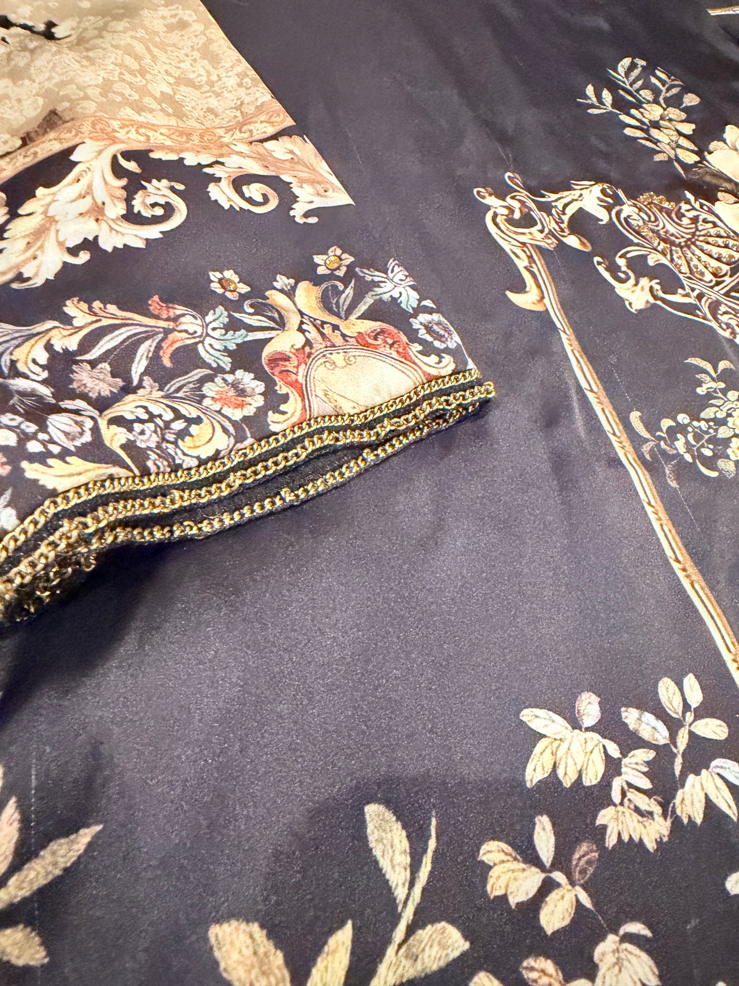 Sapphire Silk Black Shirt with Sequins spread throughout shirt and heavy embellishments around neckline.