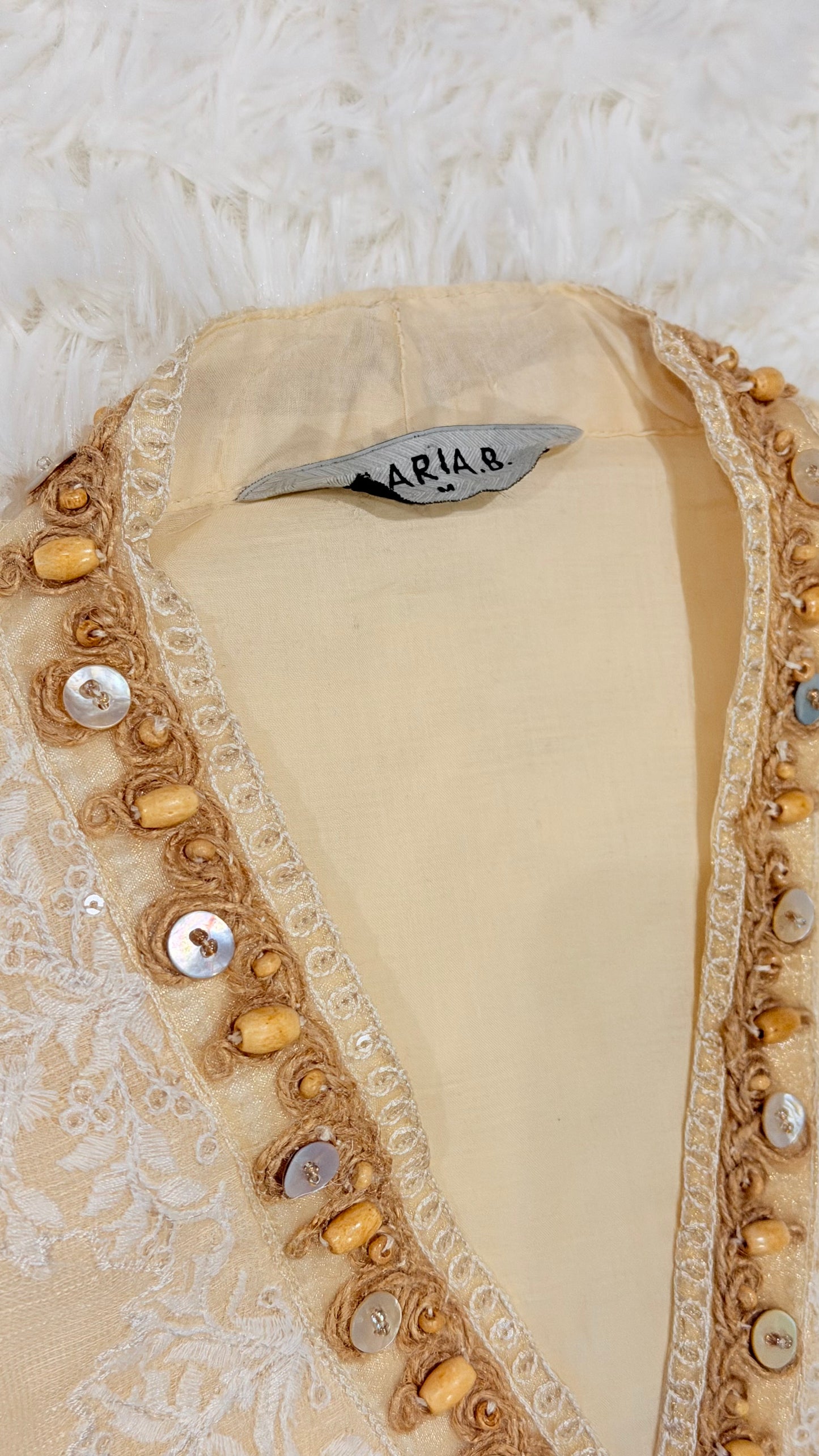 Maria B Cotton Net Cream Shirt with Emboirdery on front and Chiffon Balloon Sleeves with Embroidery on the side.