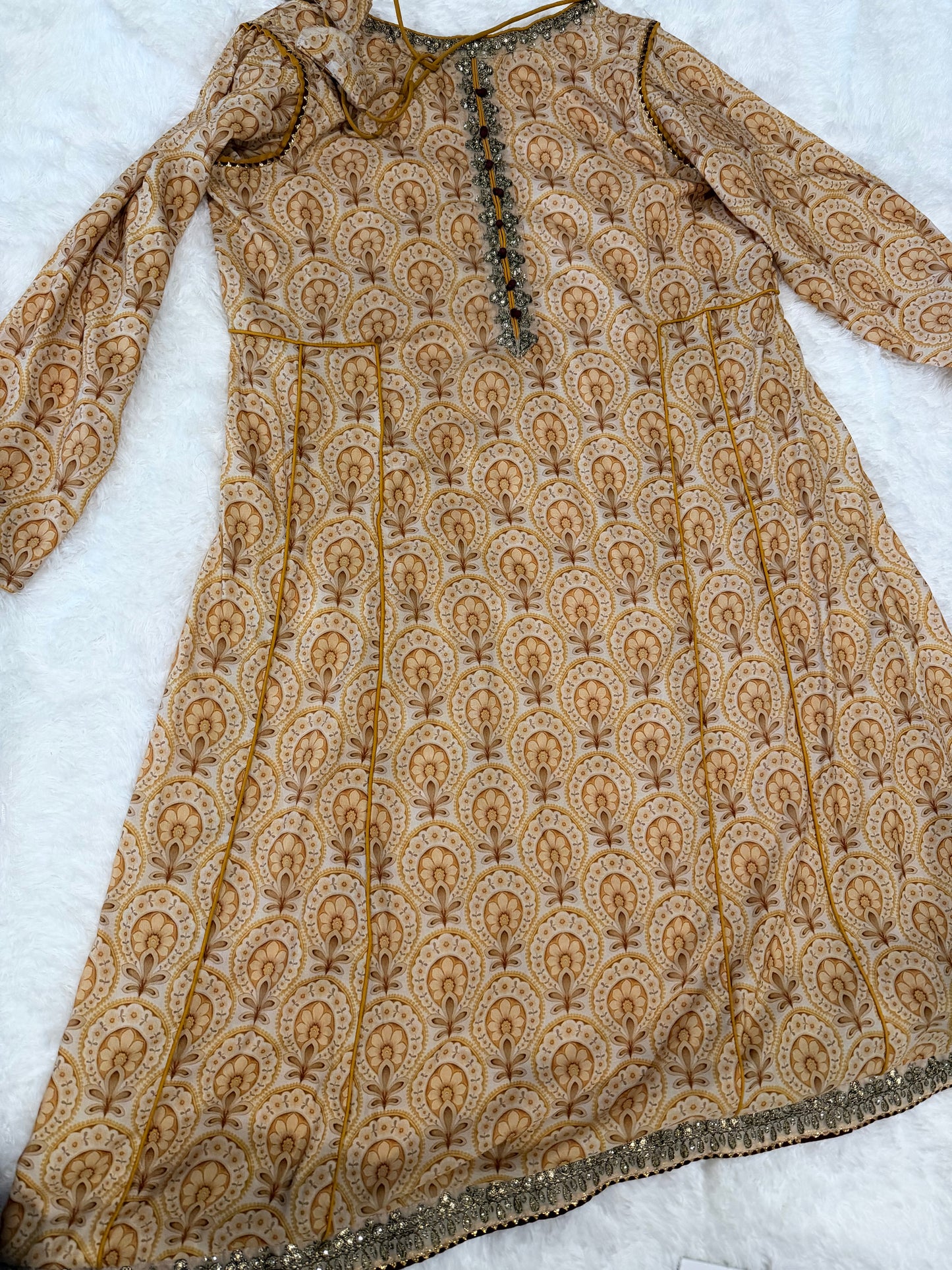 Vanya Mustard Yellow Colored Anarkali style shirt with ties.