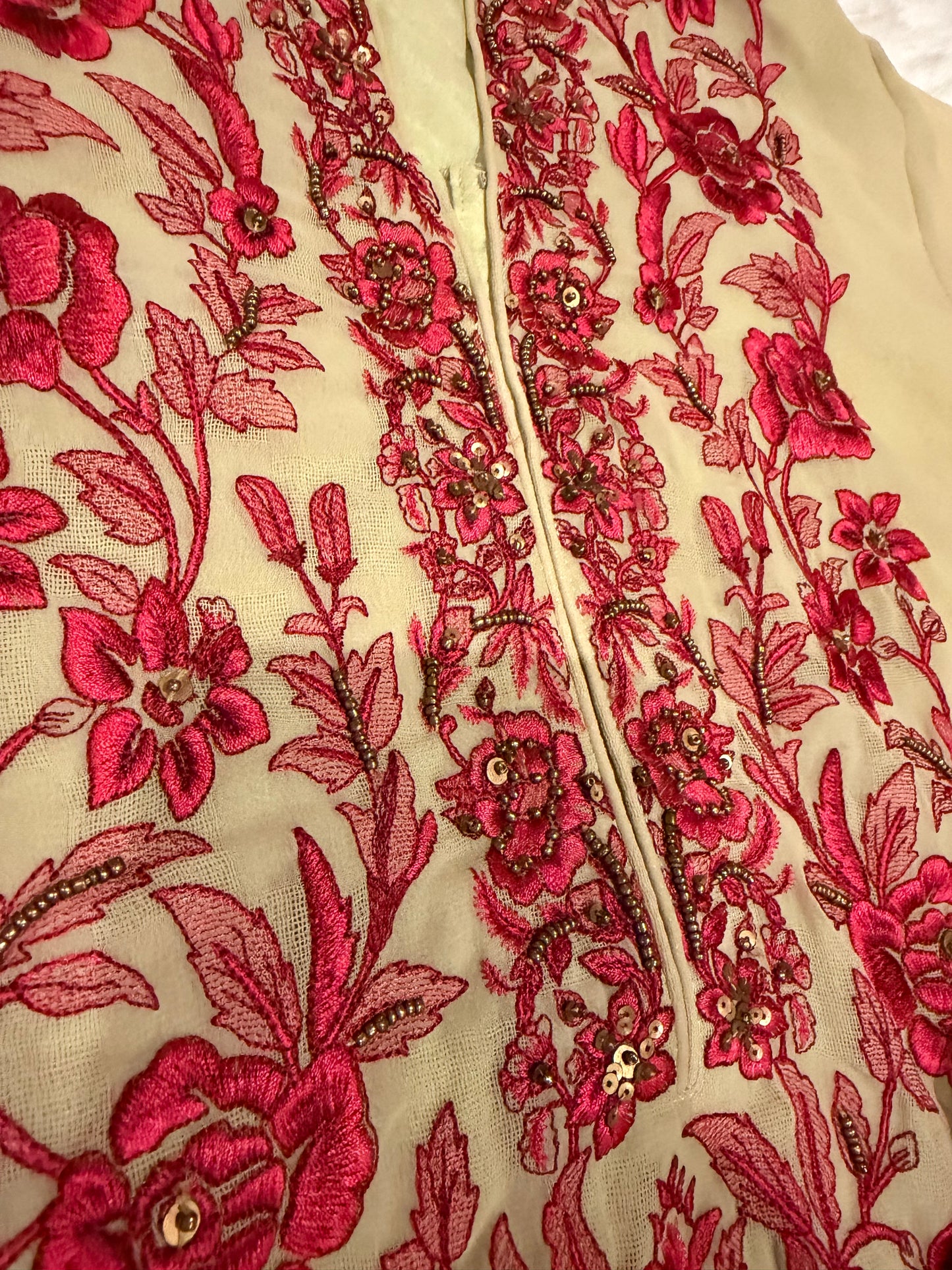 Chinyere Beige/Light Green Shirt with Magenta/Maroon Thread embroidery and golden bead accents throughout.