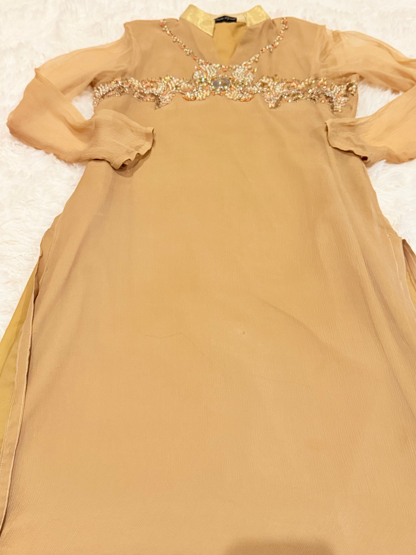 Amna Ajmal Couture Chiffon Lux Shirt in Beige color with heavy stone embellishments, comes with matching wide leg trouser in silk