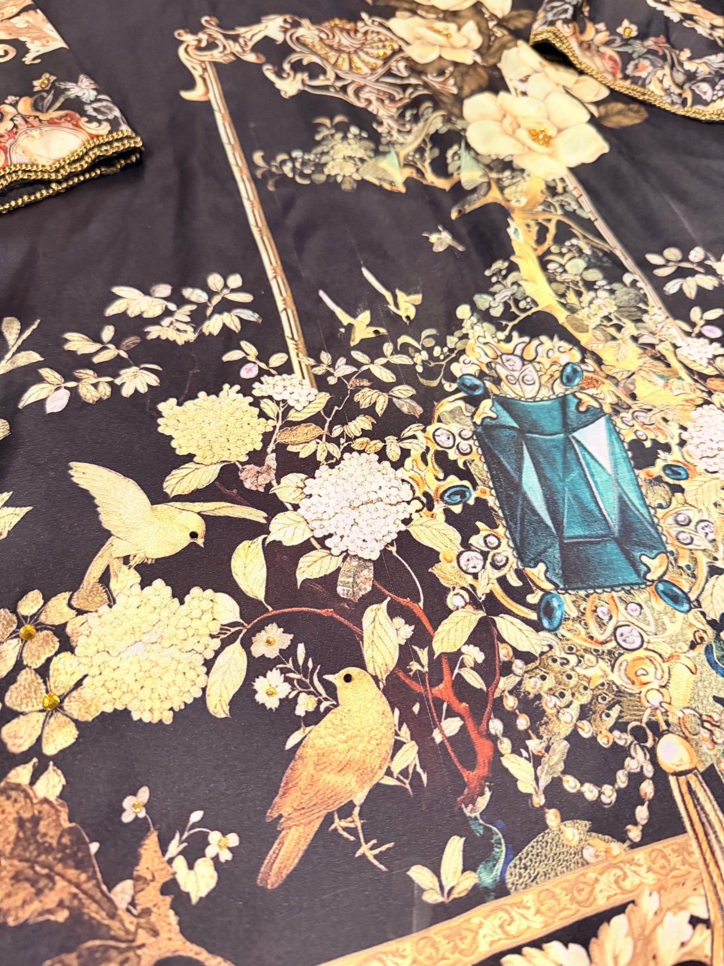 Sapphire Silk Black Shirt with Sequins spread throughout shirt and heavy embellishments around neckline.