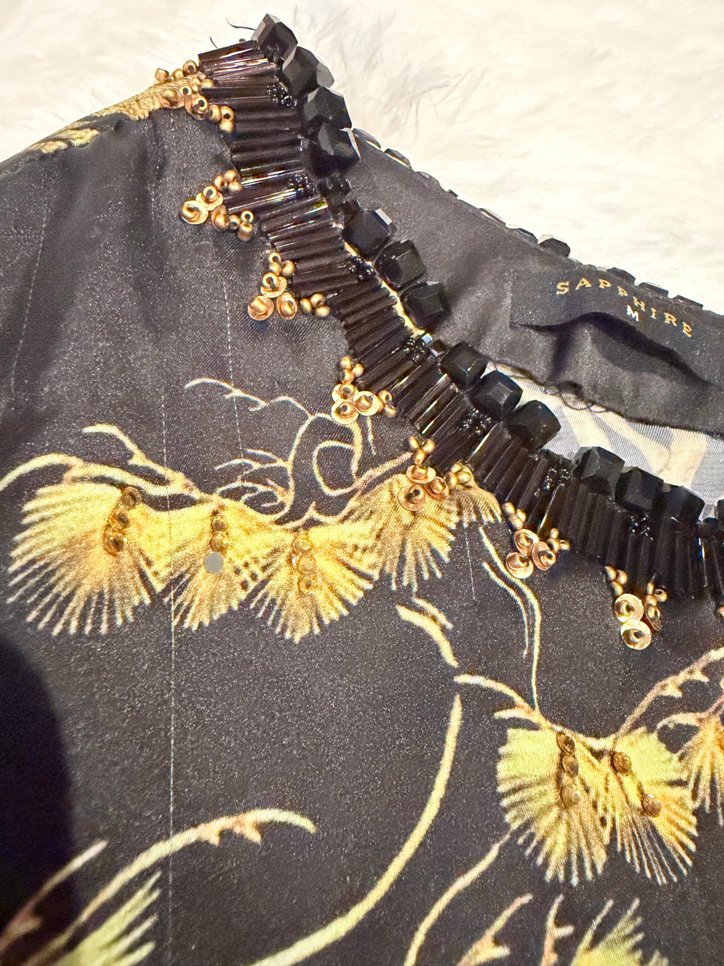 Sapphire Silk Black Shirt with Sequins spread throughout shirt and heavy embellishments around neckline.