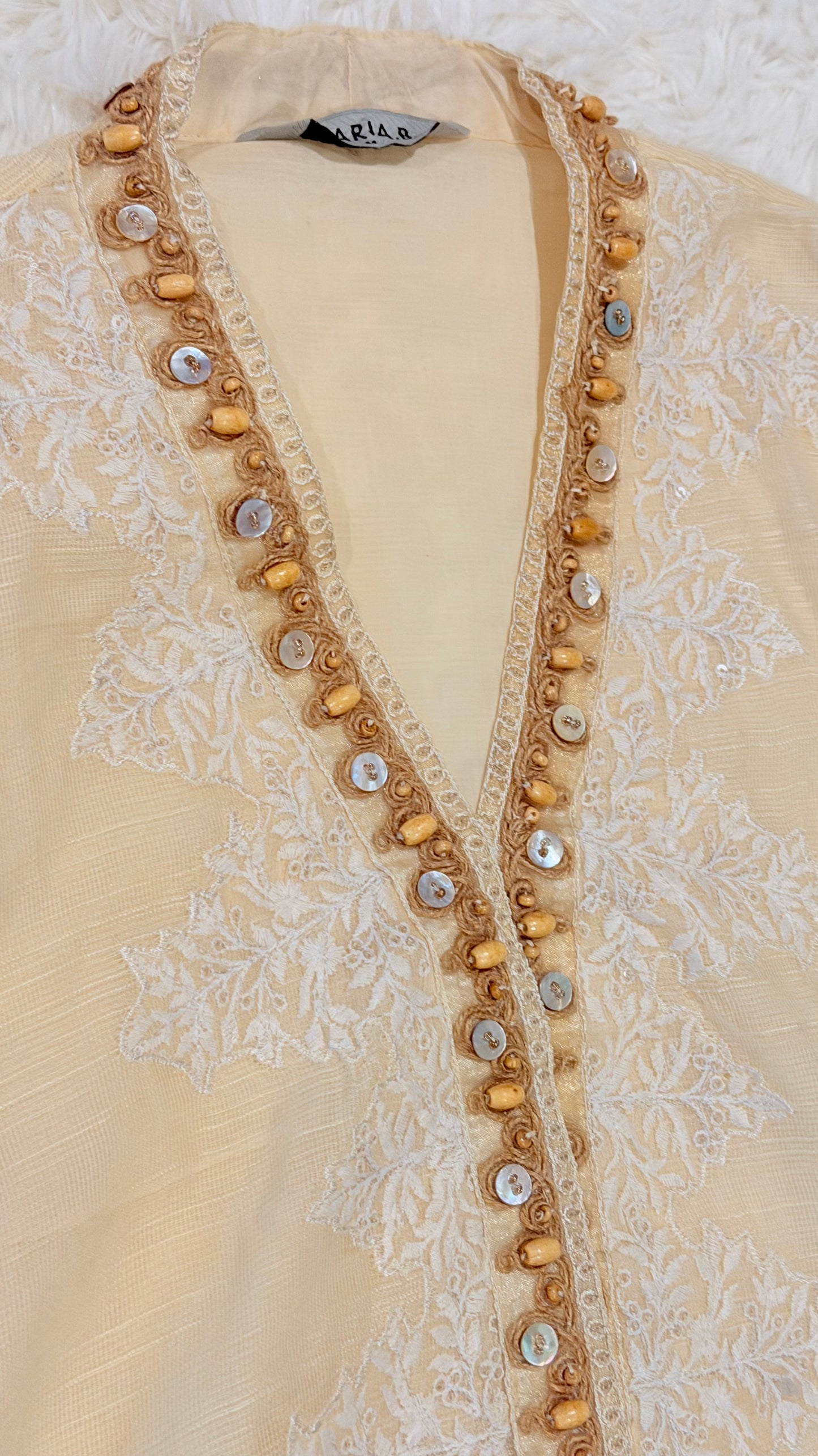 Maria B Cotton Net Cream Shirt with Emboirdery on front and Chiffon Balloon Sleeves with Embroidery on the side.