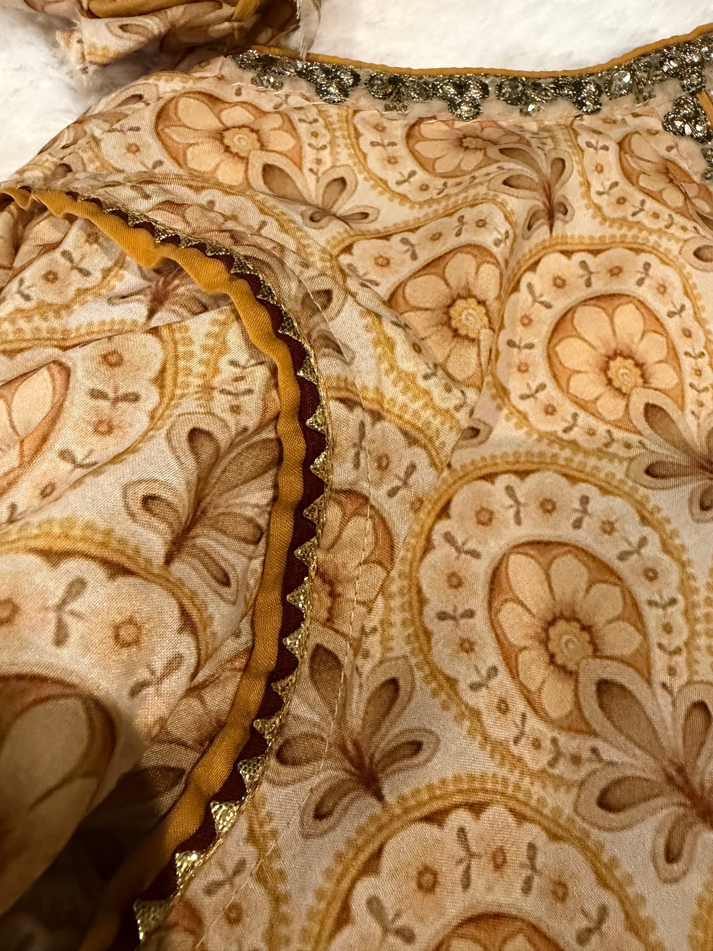 Vanya Mustard Yellow Colored Anarkali style shirt with ties.