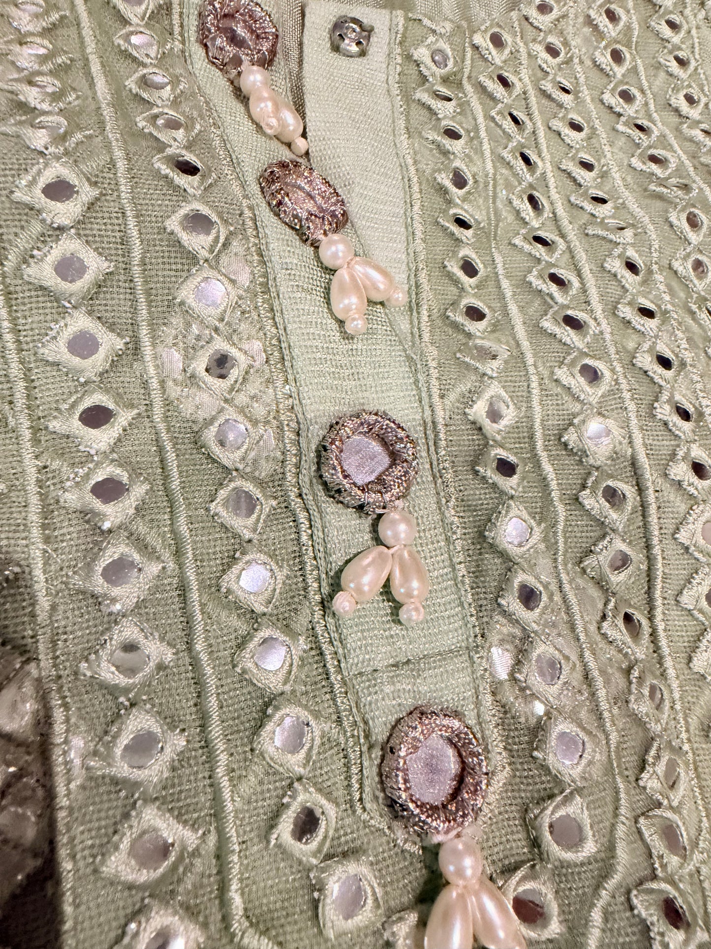 Cross Stitch Sea Green Shirt with Embroidery and Mirror Like work throughout with Pearl and Mirror-look buttons.