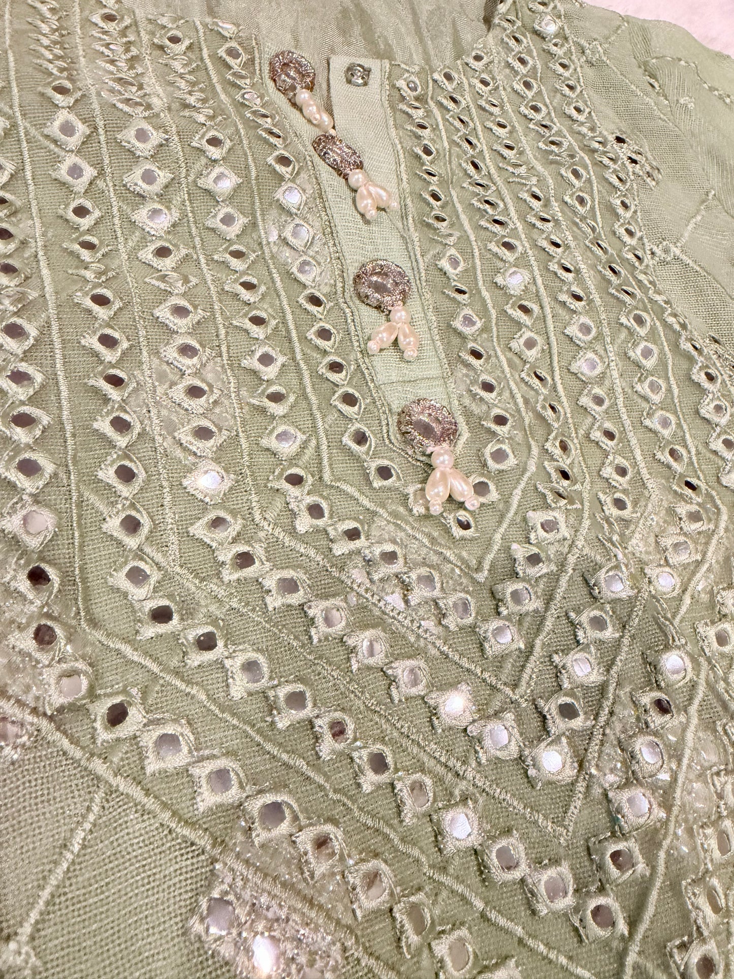 Cross Stitch Sea Green Shirt with Embroidery and Mirror Like work throughout with Pearl and Mirror-look buttons.