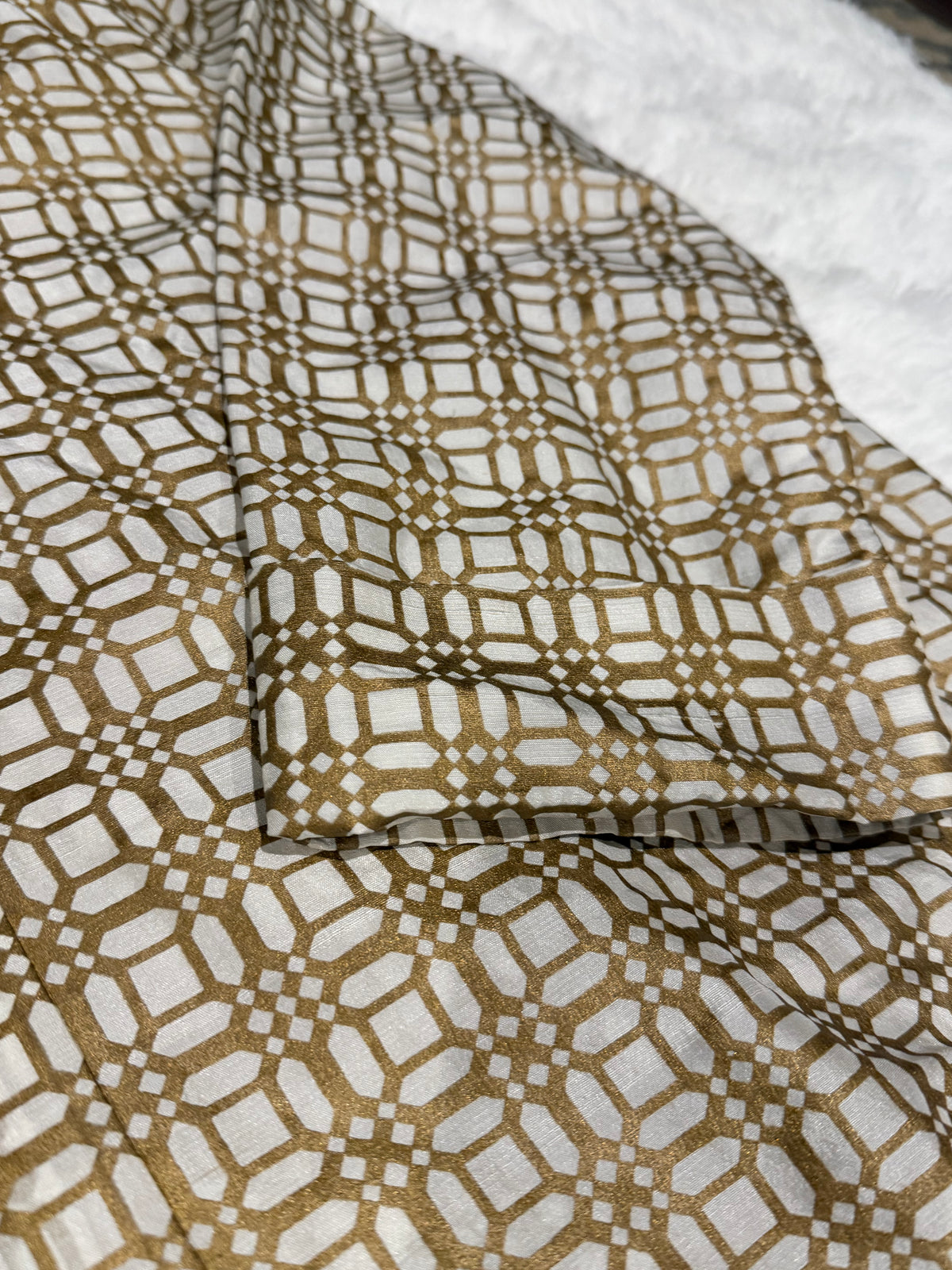 Sania Maskatiya Silk Block Printed Kurta style shirt with different front hem length and signature Sania embellishments on neckline.