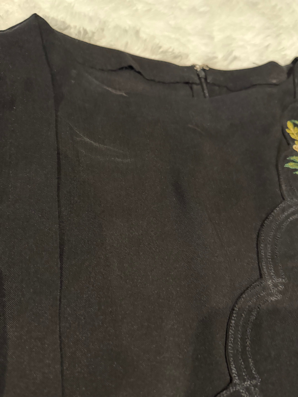 Asifa & Nabeel Long Black Shirt with Assymetric Hemline, Embroidery on front Hem and organza edged sleeves. Lovely floral embroidery near neckline