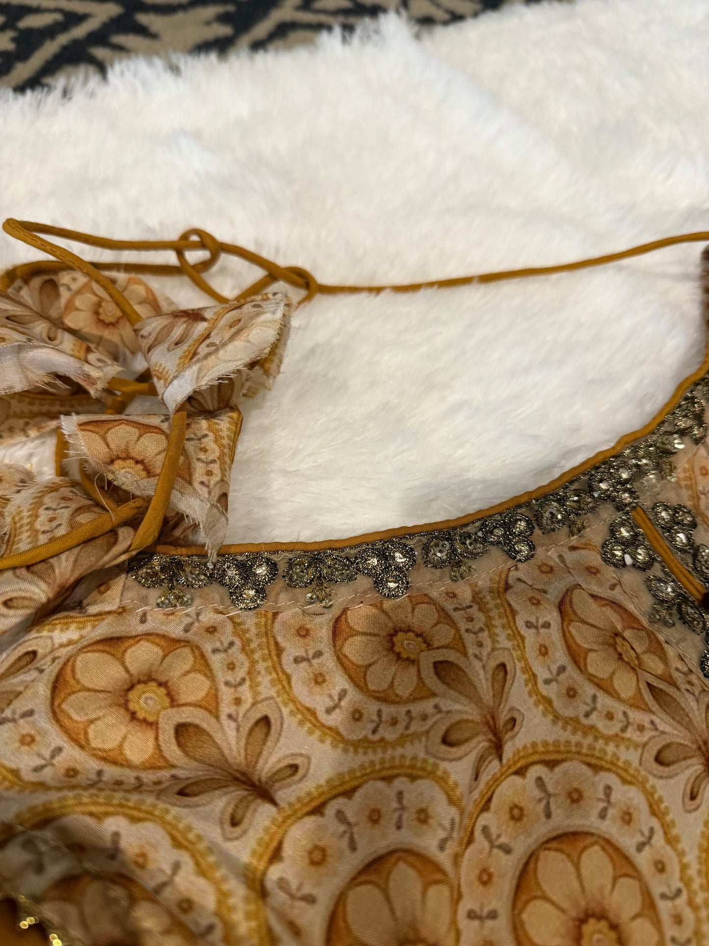 Vanya Mustard Yellow Colored Anarkali style shirt with ties.