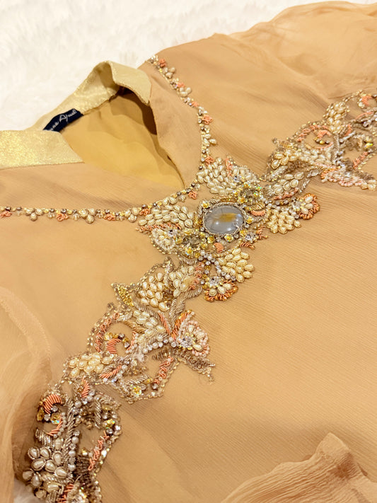 Amna Ajmal Couture Chiffon Lux Shirt in Beige color with heavy stone embellishments, comes with matching wide leg trouser in silk