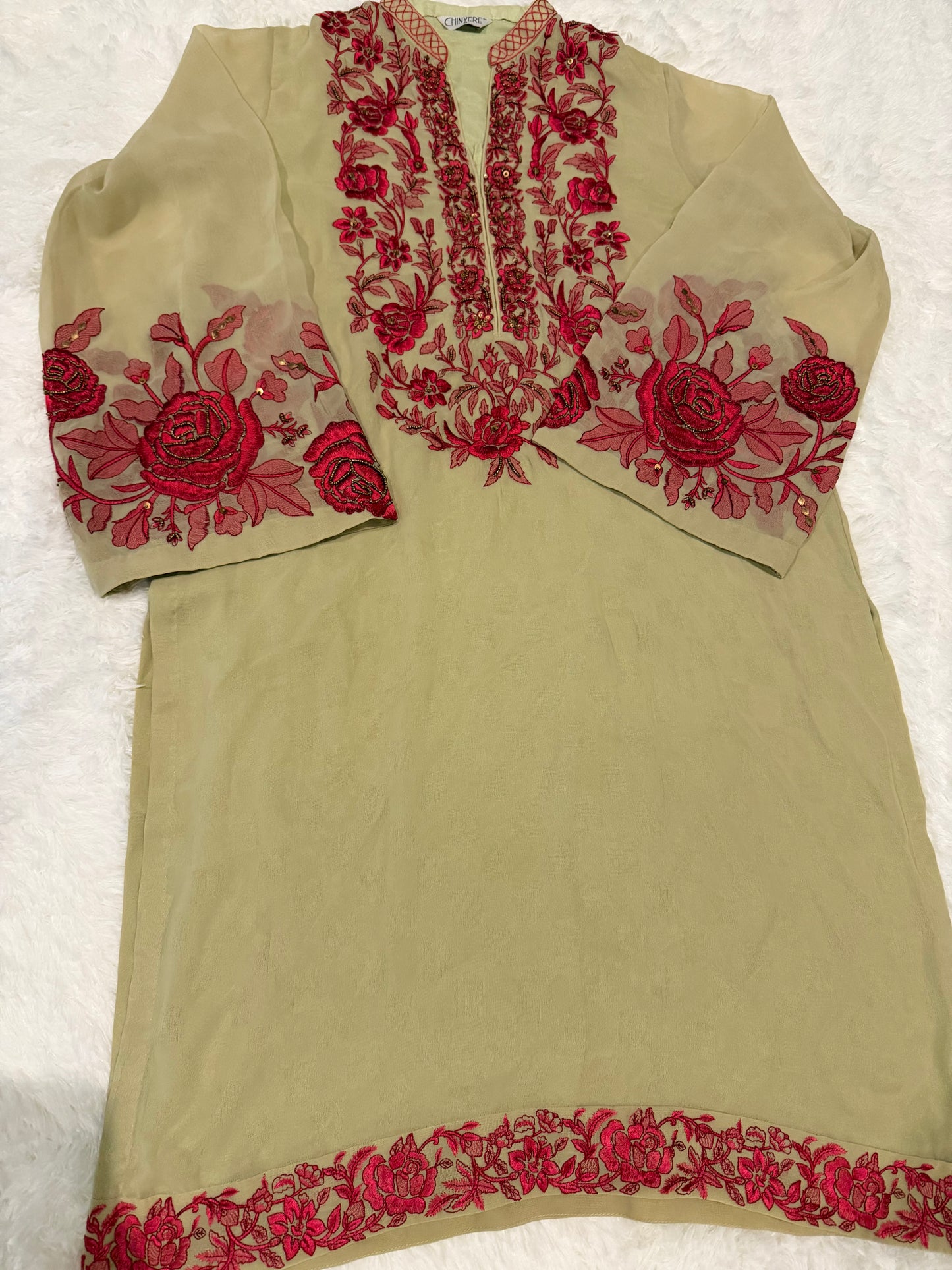 Chinyere Beige/Light Green Shirt with Magenta/Maroon Thread embroidery and golden bead accents throughout.