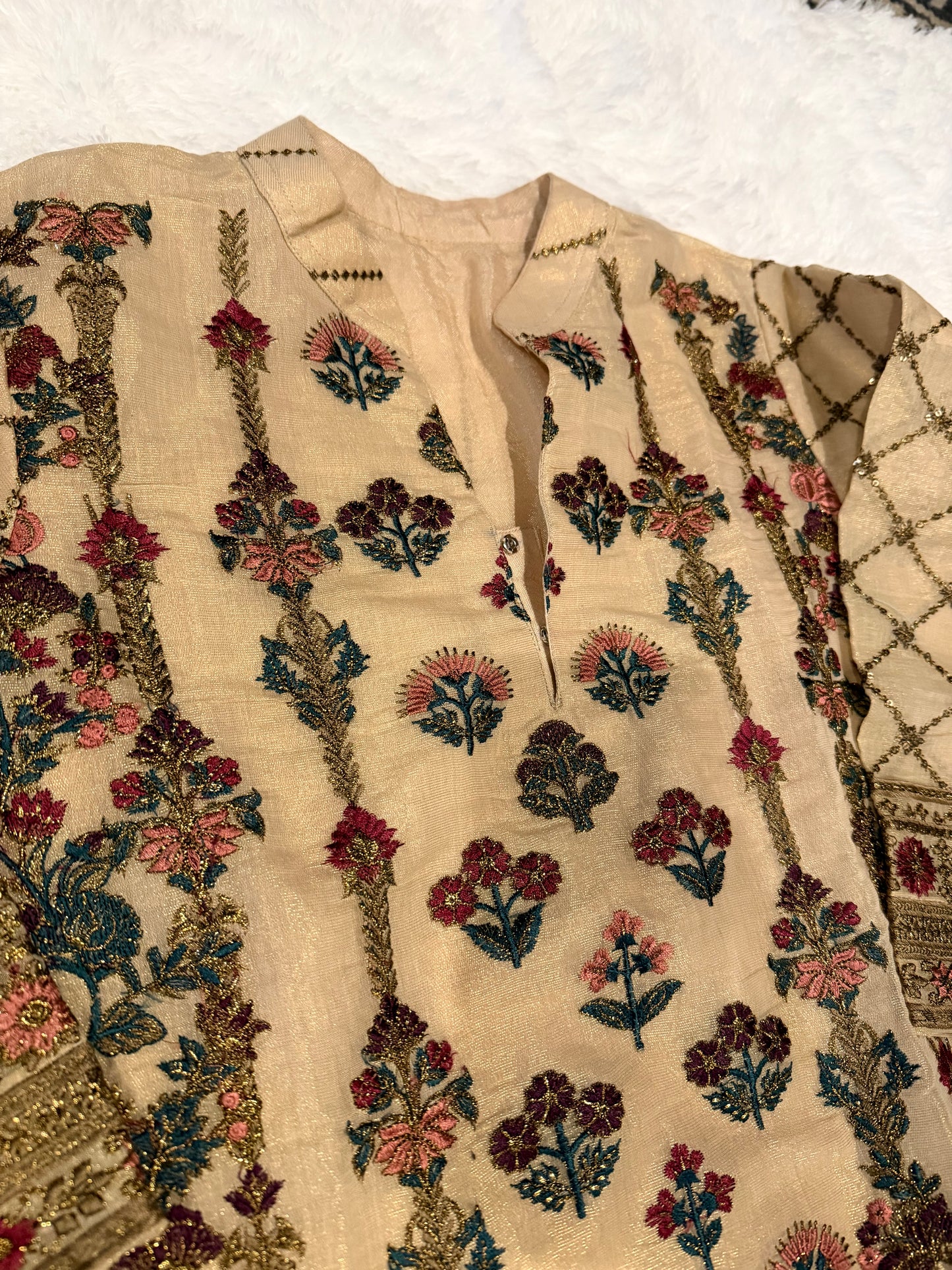 Heavily Embroidered Unbranded Golden Suit with Maroon, Pink, Green and Golden Embelishments.