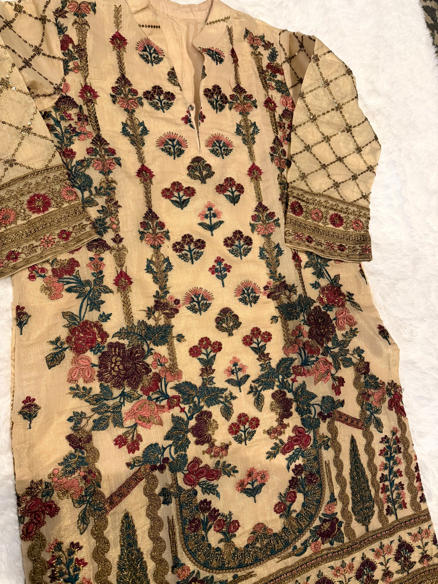 Heavily Embroidered Unbranded Golden Suit with Maroon, Pink, Green and Golden Embelishments.