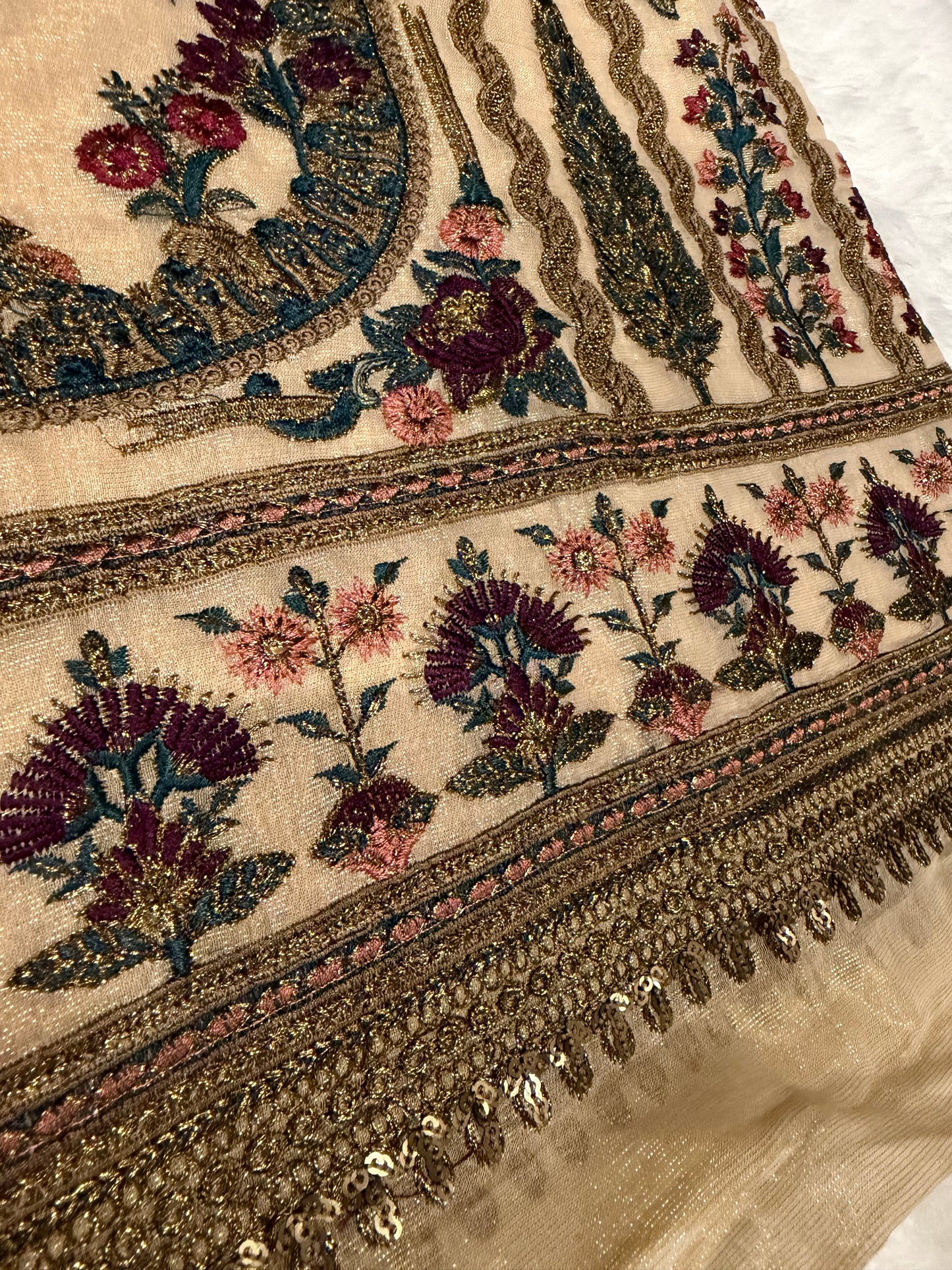 Heavily Embroidered Unbranded Golden Suit with Maroon, Pink, Green and Golden Embelishments.