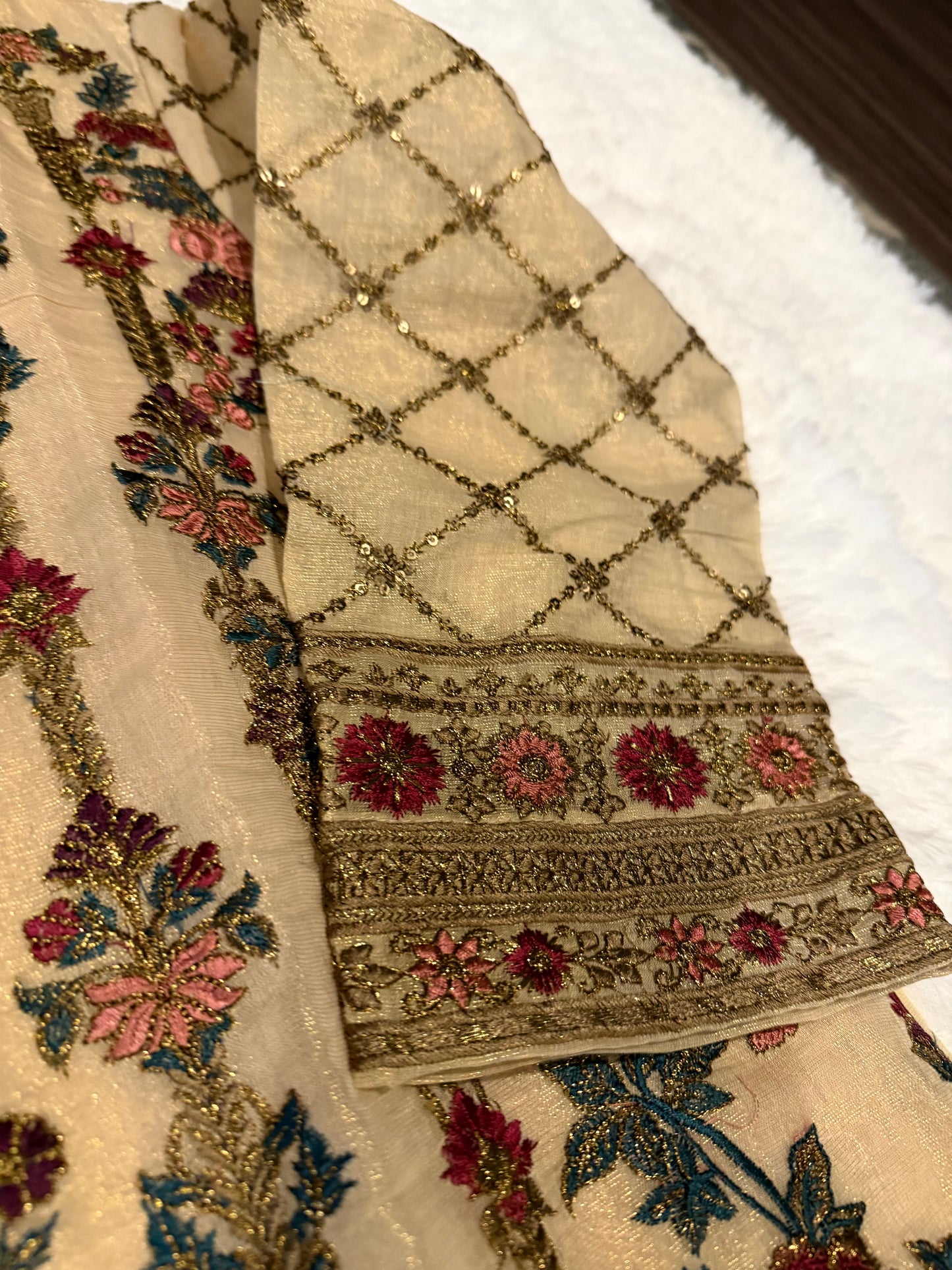 Heavily Embroidered Unbranded Golden Suit with Maroon, Pink, Green and Golden Embelishments.